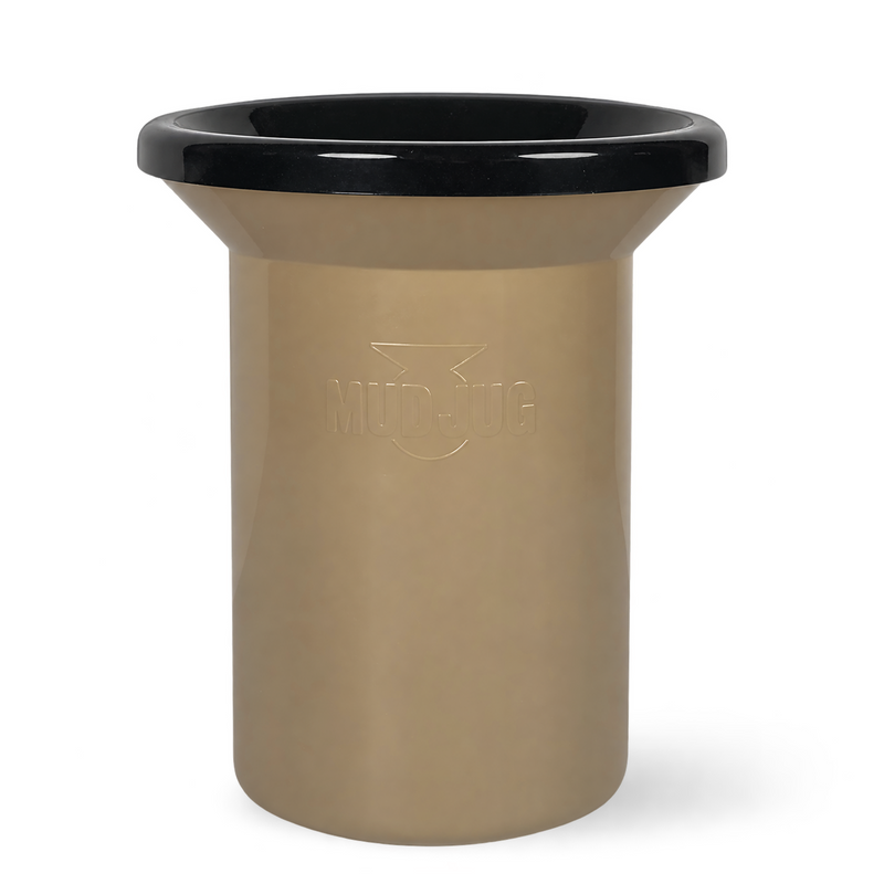 A tan cylindrical mudguard with a black flared rim, featuring an embossed 'MUD JUG' logo on the front, set against a plain white background.