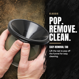 Hands holding a black funnel with an olive green base, shown with promotional text reading 'CLASSIC POP. REMOVE.