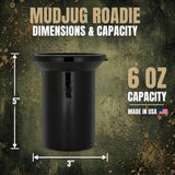A black cylindrical mud jug with a flared top, shown with overlaid dimension arrows and text reading 5 inches tall, 3 inches wide, and 6 oz capacity on a textured dark green and brown background. Large headline text says MUDJUG ROADIE.